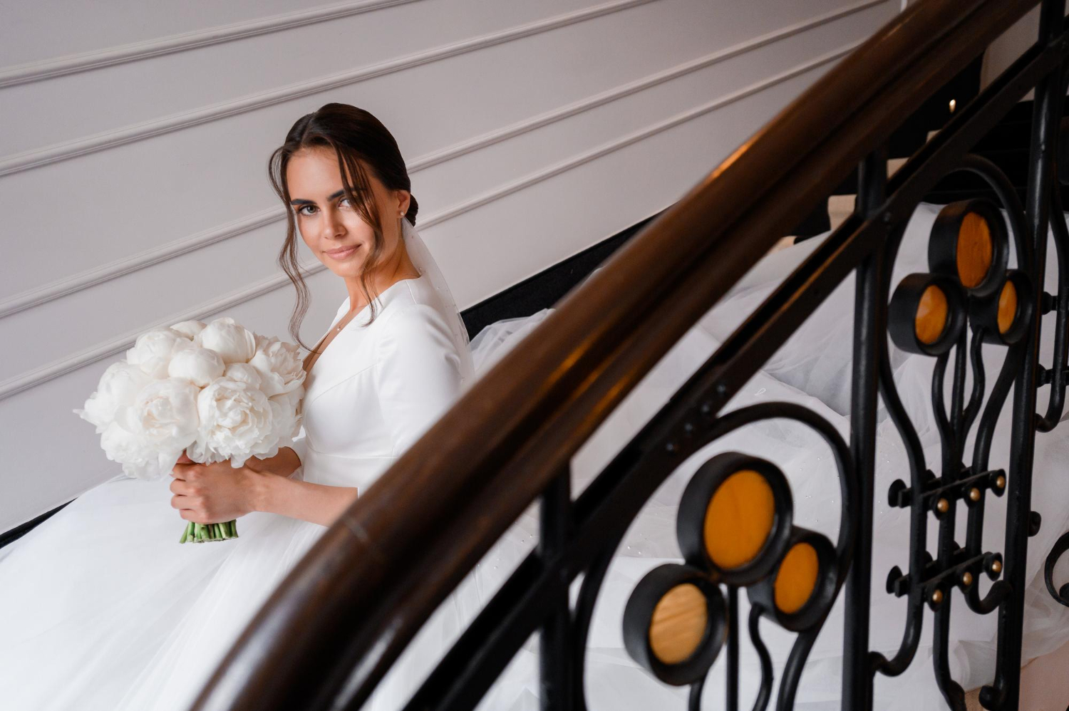 Romantic bride in classic satin dress